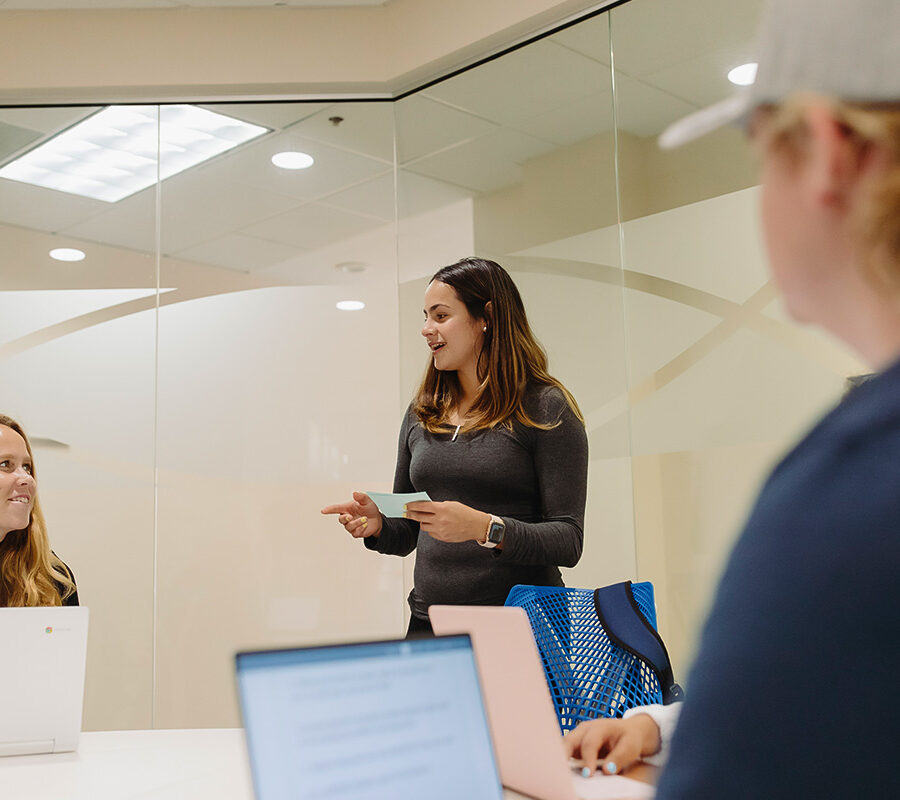 students from the philosophy major study in the library