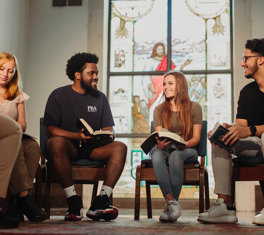 Ministry students read bibles together.