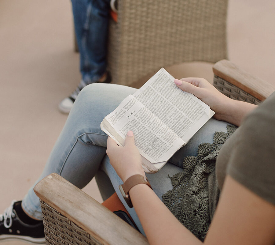 A biblical studies major reading a Bible